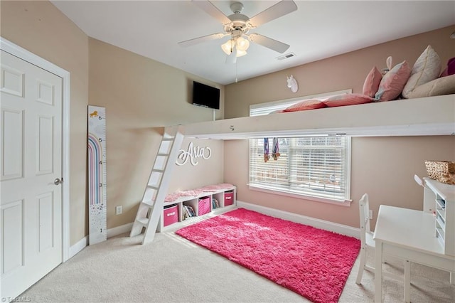 bedroom featuring ceiling fan, carpet, visible vents, and baseboards