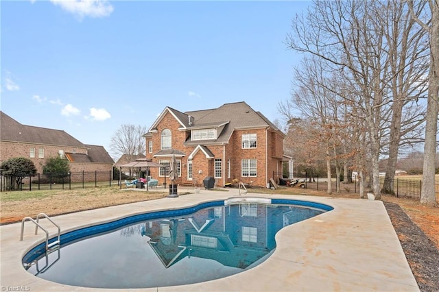 view of pool with a gazebo, a patio area, a fenced in pool, and fence