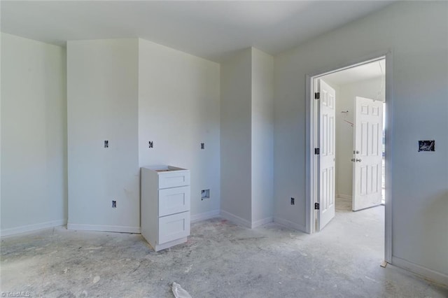 interior space featuring baseboards