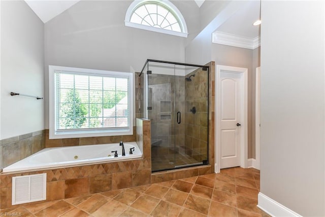 full bathroom with visible vents, a stall shower, plenty of natural light, and a bath