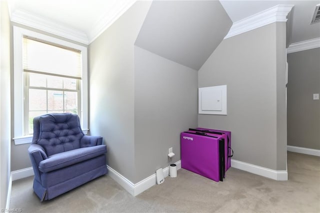 sitting room featuring crown molding, carpet floors, baseboards, lofted ceiling, and visible vents