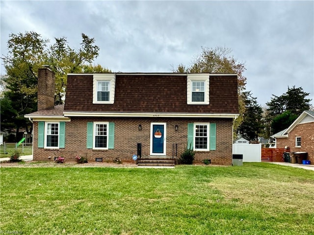 view of front of property with a front lawn