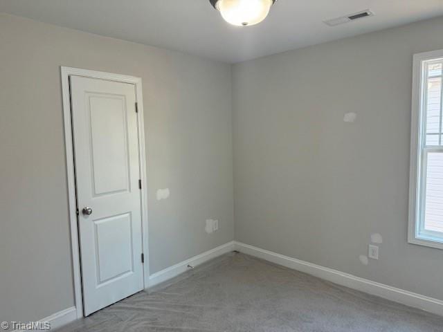 view of carpeted spare room