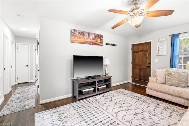 1126 E Springfield Rd, High Point, NC 27263 - living room with baseboards, wood finished floors, and ceiling fan