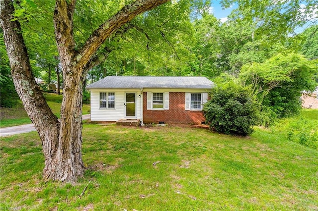 1126 E Springfield Rd, High Point, NC 27263 - view of front of house featuring crawl space, a front yard, and brick siding