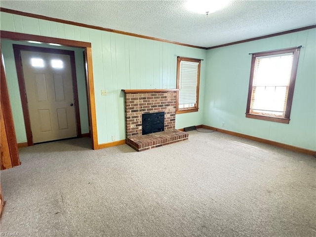 2121/2117 Swan Creek Rd, Jonesville, NC 28642 - unfurnished living room featuring carpet, a textured ceiling, ornamental molding, a brick fireplace, and baseboards