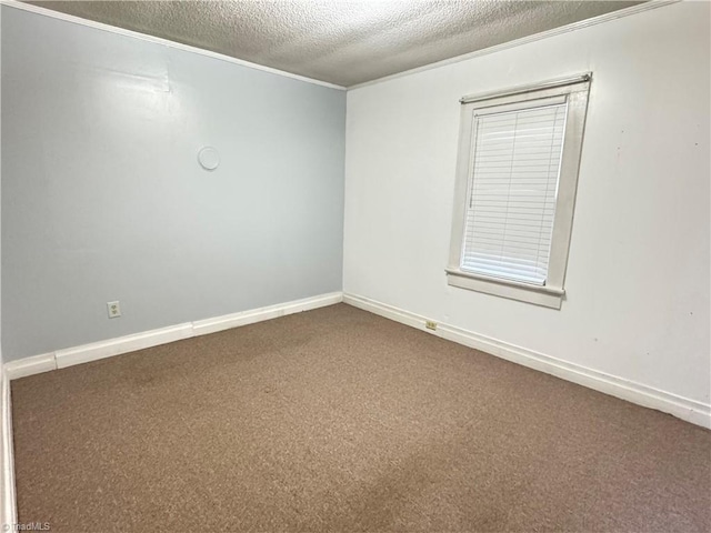 2121/2117 Swan Creek Rd, Jonesville, NC 28642 - unfurnished room featuring a textured ceiling, dark colored carpet, ornamental molding, and baseboards