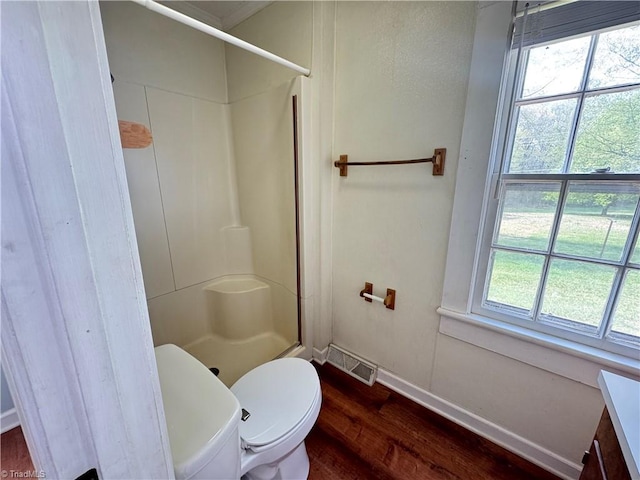 2121/2117 Swan Creek Rd, Jonesville, NC 28642 - bathroom with baseboards, a stall shower, toilet, visible vents, and wood finished floors