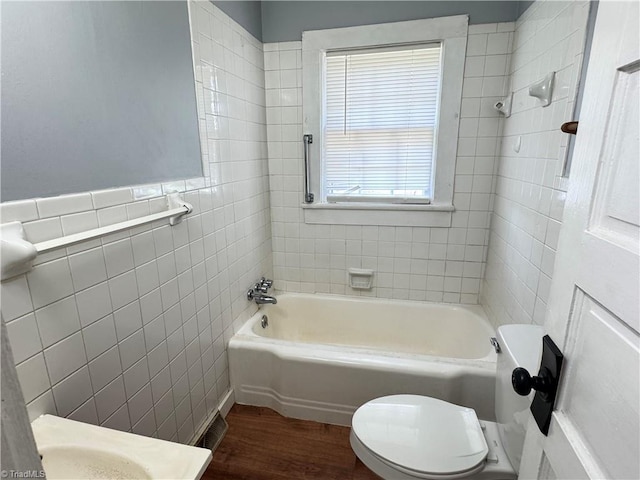 2121/2117 Swan Creek Rd, Jonesville, NC 28642 - bathroom featuring visible vents, tile walls, toilet, and wood finished floors