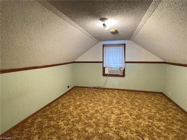 2121/2117 Swan Creek Rd, Jonesville, NC 28642 - additional living space with cooling unit, a textured ceiling, lofted ceiling, and carpet floors