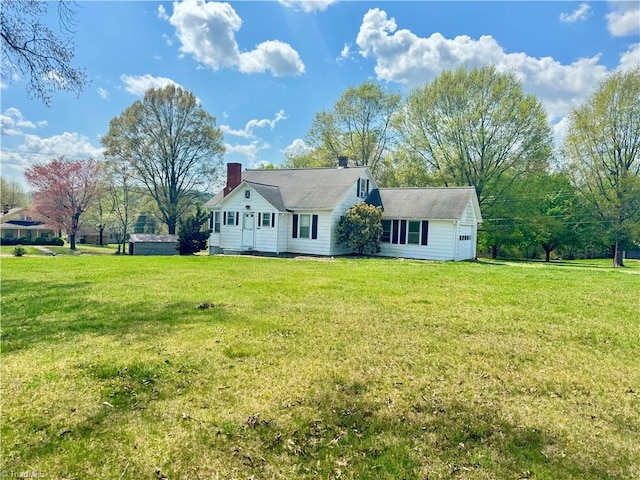 2121/2117 Swan Creek Rd, Jonesville, NC 28642 - view of front of home featuring a chimney and a front lawn