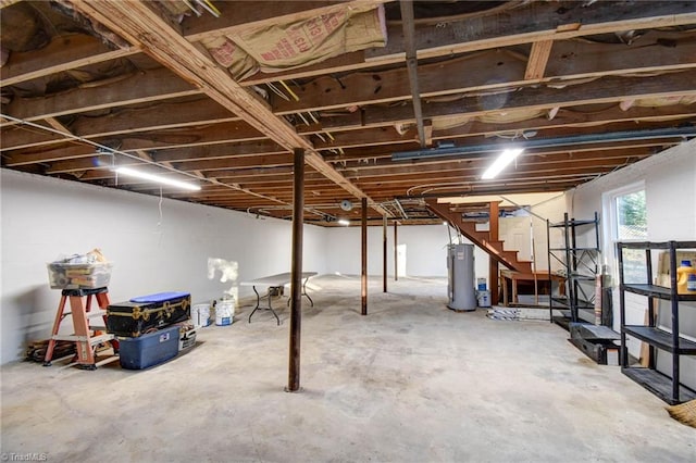 basement featuring electric water heater