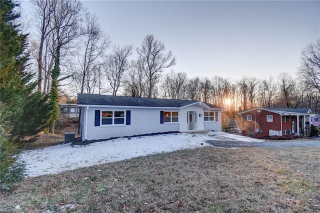 ranch-style house with central AC