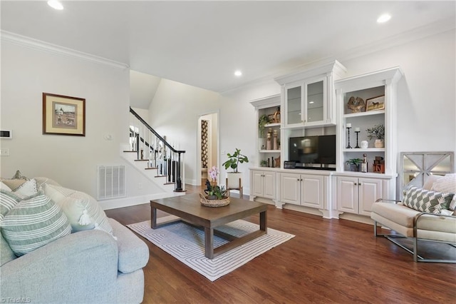 6204 Calendula Ct, Summerfield, NC 27358 - living area featuring ornamental molding, stairs, dark wood-type flooring, and recessed lighting
