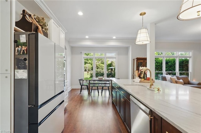6204 Calendula Ct, Summerfield, NC 27358 - kitchen with freestanding refrigerator, a sink, dishwasher, ornamental molding, and recessed lighting