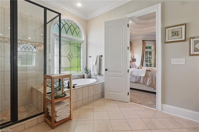 6204 Calendula Ct, Summerfield, NC 27358 - ensuite bathroom with crown molding, a garden tub, tile patterned flooring, a shower stall, and baseboards
