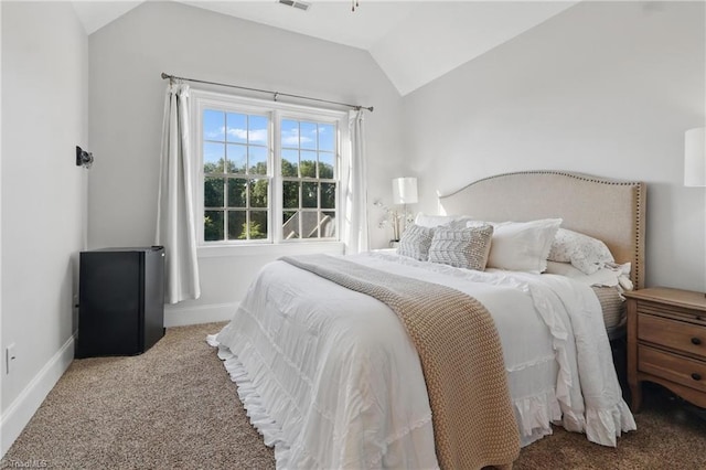 6204 Calendula Ct, Summerfield, NC 27358 - bedroom featuring vaulted ceiling, carpet flooring, and baseboards