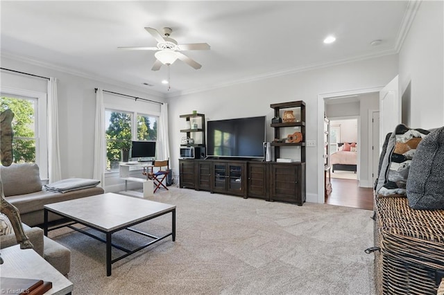 6204 Calendula Ct, Summerfield, NC 27358 - carpeted living room featuring ceiling fan, crown molding, and recessed lighting