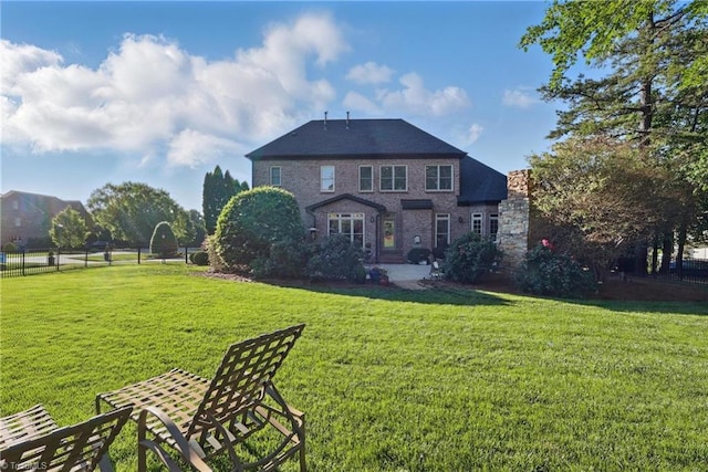 6204 Calendula Ct, Summerfield, NC 27358 - back of house featuring brick siding and a patio