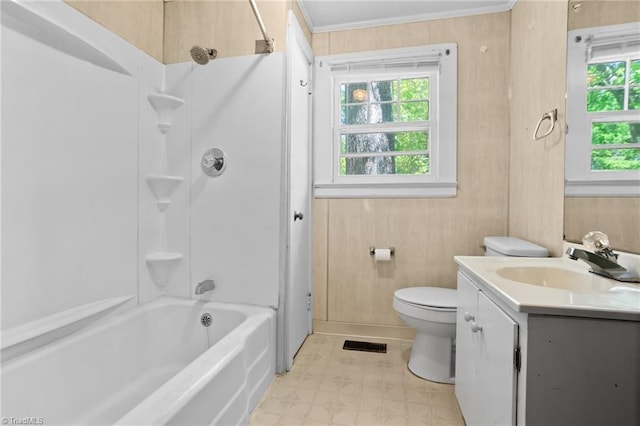 full bathroom with vanity, toilet, tub / shower combination, and a wealth of natural light