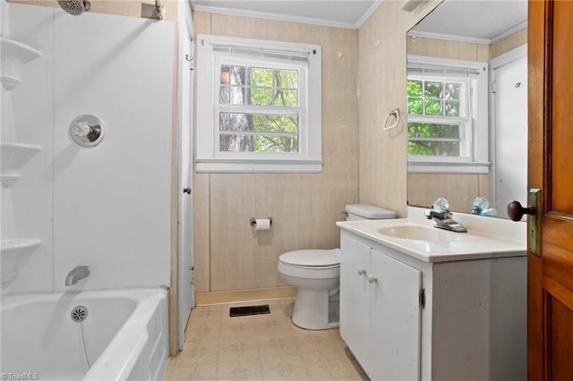 full bathroom featuring vanity, a healthy amount of sunlight, toilet, and ornamental molding