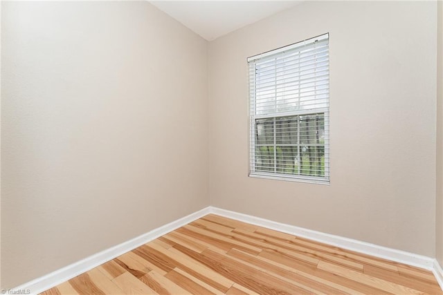 2305 Hartfield Cir, Winston-Salem, NC 27103 - unfurnished room with light wood finished floors, plenty of natural light, and baseboards
