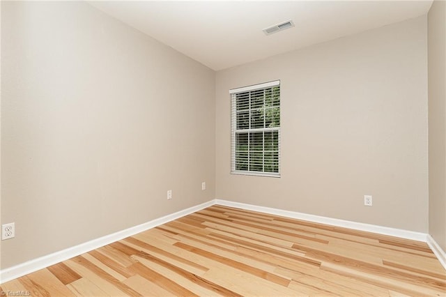 2305 Hartfield Cir, Winston-Salem, NC 27103 - spare room with light wood-type flooring and baseboards