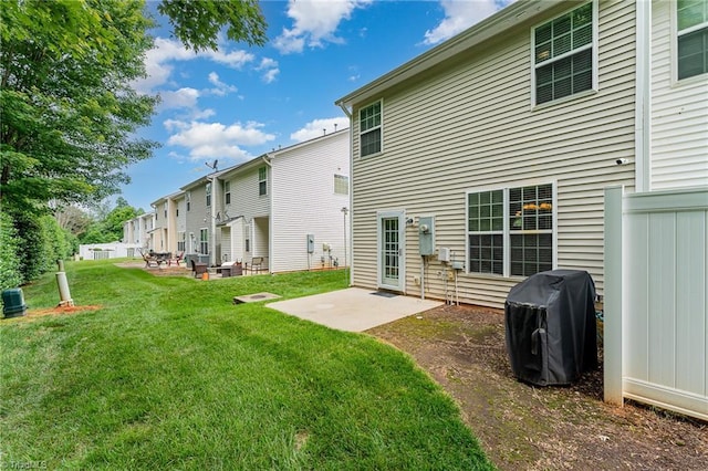 2305 Hartfield Cir, Winston-Salem, NC 27103 - rear view of house featuring a lawn, a residential view, and a patio area