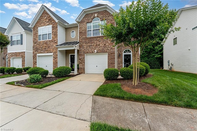 2305 Hartfield Cir, Winston-Salem, NC 27103 - multi unit property with concrete driveway, a standing seam roof, a front yard, stone siding, and an attached garage