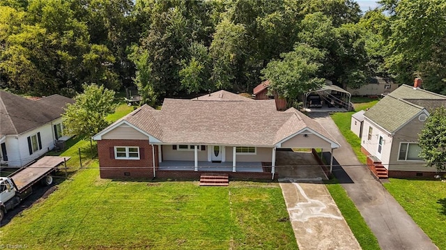 exterior space with covered porch and a front yard