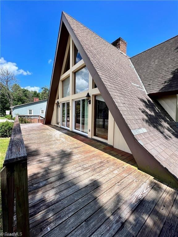 wooden terrace featuring french doors