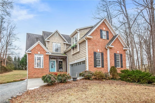 view of front of home with a garage