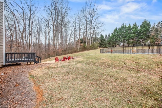 view of yard featuring a swimming pool side deck