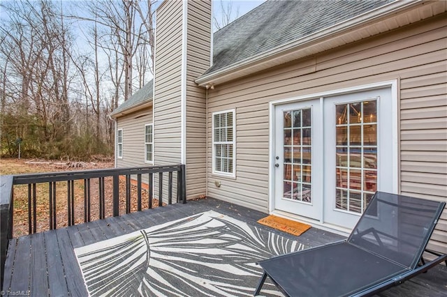 wooden deck featuring french doors