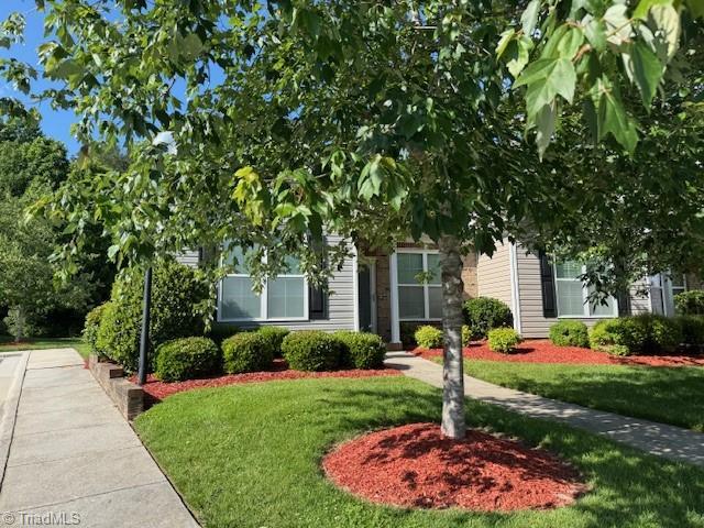 4373 Rex Ct, Winston-Salem, NC 27107 - obstructed view of property featuring a front lawn