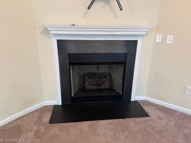 4373 Rex Ct, Winston-Salem, NC 27107 - detailed view of carpet floors, baseboards, and a fireplace with flush hearth