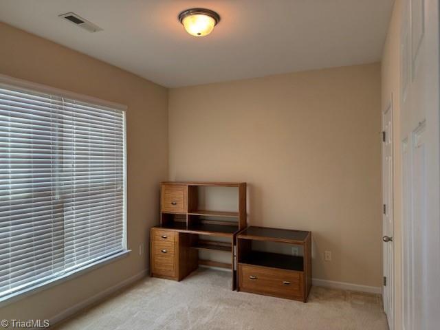4373 Rex Ct, Winston-Salem, NC 27107 - unfurnished office featuring light carpet and baseboards