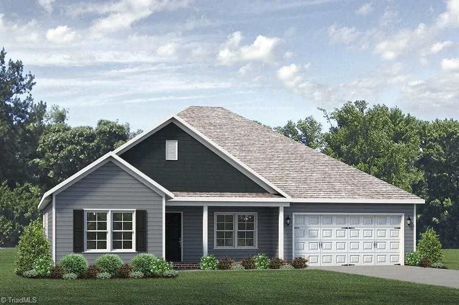 207 Royal Pines Dr Lot 122, Trinity, NC 27370 - view of front of home with an attached garage, a front yard, concrete driveway, and roof with shingles
