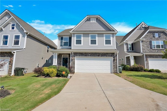 view of front facade with a front yard and a garage