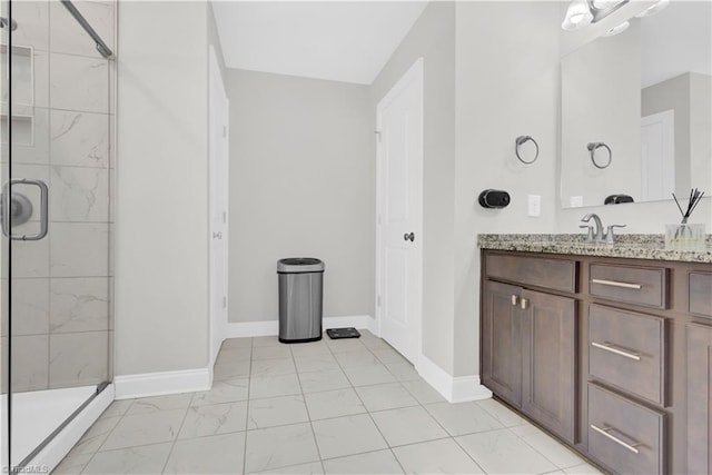 bathroom with vanity and walk in shower