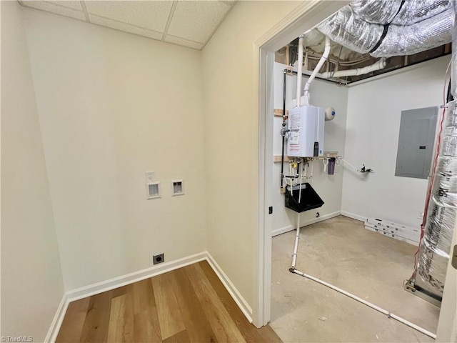 washroom featuring washer hookup, hookup for an electric dryer, water heater, electric panel, and hardwood / wood-style floors