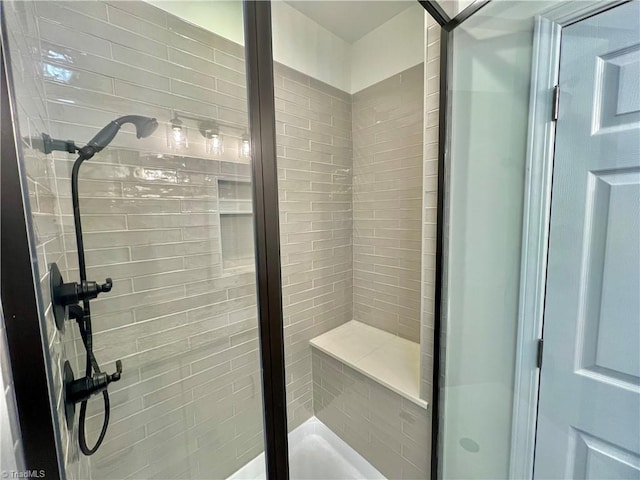 bathroom featuring an enclosed shower