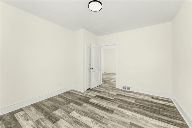 127 Oak Summit Rd, Winston-Salem, NC 27105 - unfurnished room with wood finished floors and baseboards