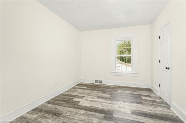 127 Oak Summit Rd, Winston-Salem, NC 27105 - empty room featuring wood finished floors and baseboards