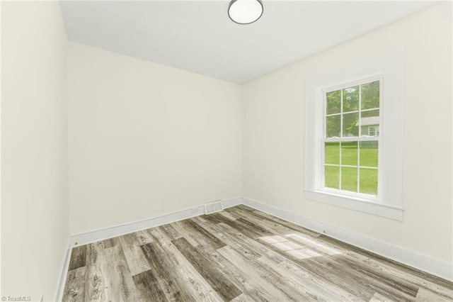 127 Oak Summit Rd, Winston-Salem, NC 27105 - spare room featuring wood finished floors and baseboards