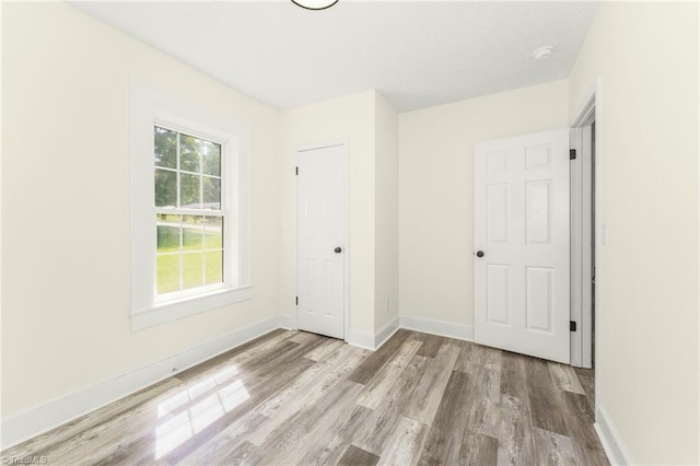 127 Oak Summit Rd, Winston-Salem, NC 27105 - unfurnished bedroom with wood finished floors