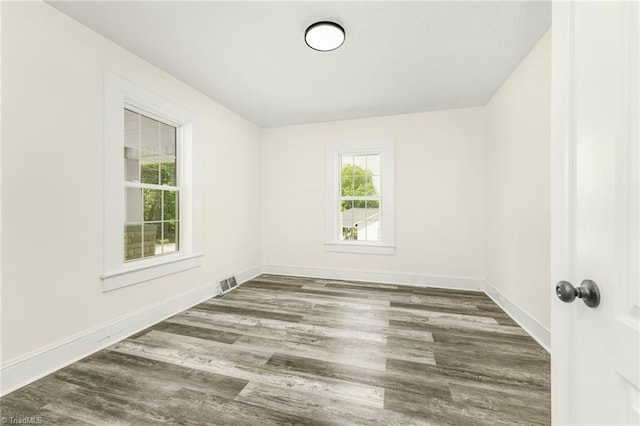 127 Oak Summit Rd, Winston-Salem, NC 27105 - spare room featuring wood finished floors and baseboards