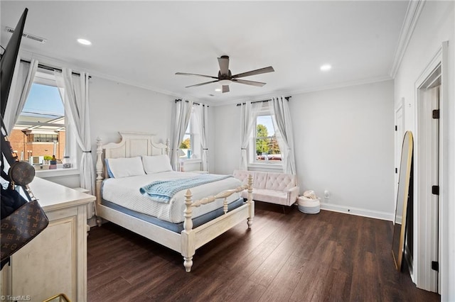 bedroom with dark hardwood / wood-style flooring, ornamental molding, and ceiling fan