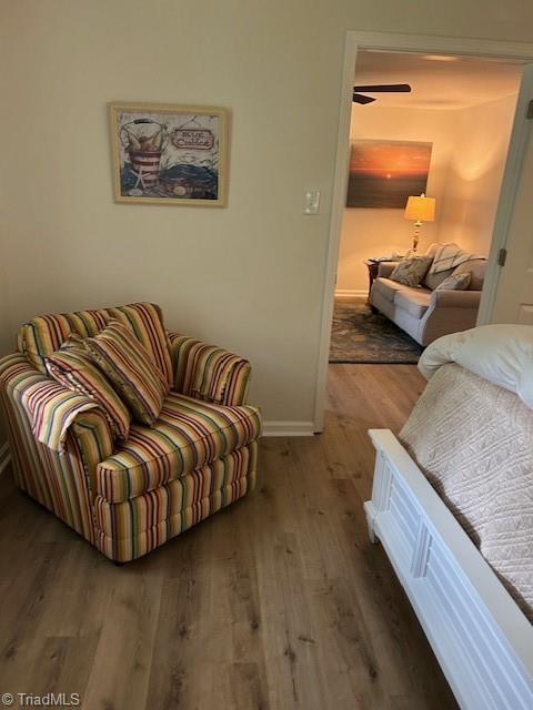545 S Fieldcrest Rd, Eden, NC 27288 - sitting room featuring wood finished floors, baseboards, and a ceiling fan