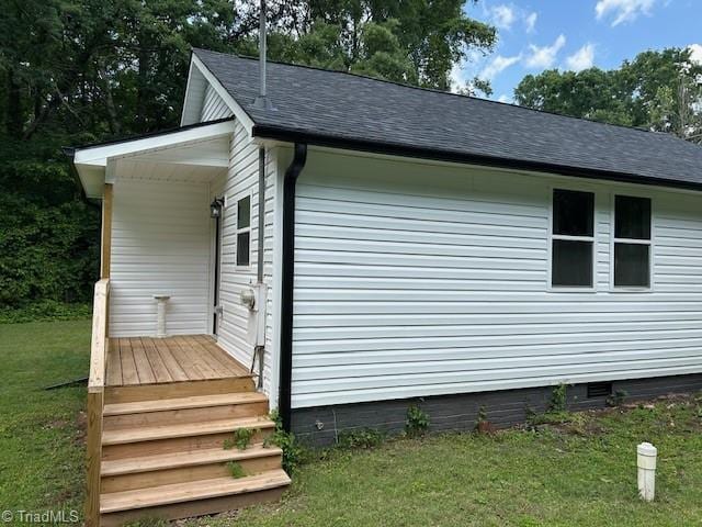 545 S Fieldcrest Rd, Eden, NC 27288 - view of side of property featuring crawl space, a yard, and a shingled roof